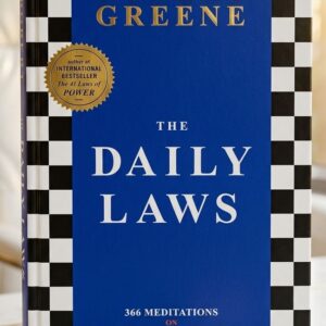 Cover of The Daily Laws: 366 Meditations on Power, Seduction, Mastery, Strategy, and Human Nature by Robert Greene, a daily personal development and leadership guide.