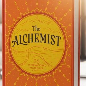 Front cover of The Alchemist by Paulo Coelho featuring an artistic desert landscape with symbolic imagery representing a journey of dreams and self-discovery.