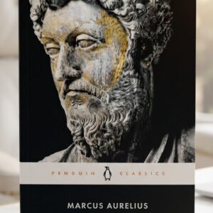 Front cover of Meditations by Marcus Aurelius featuring a classical portrait or statue of the Roman emperor with elegant typography.